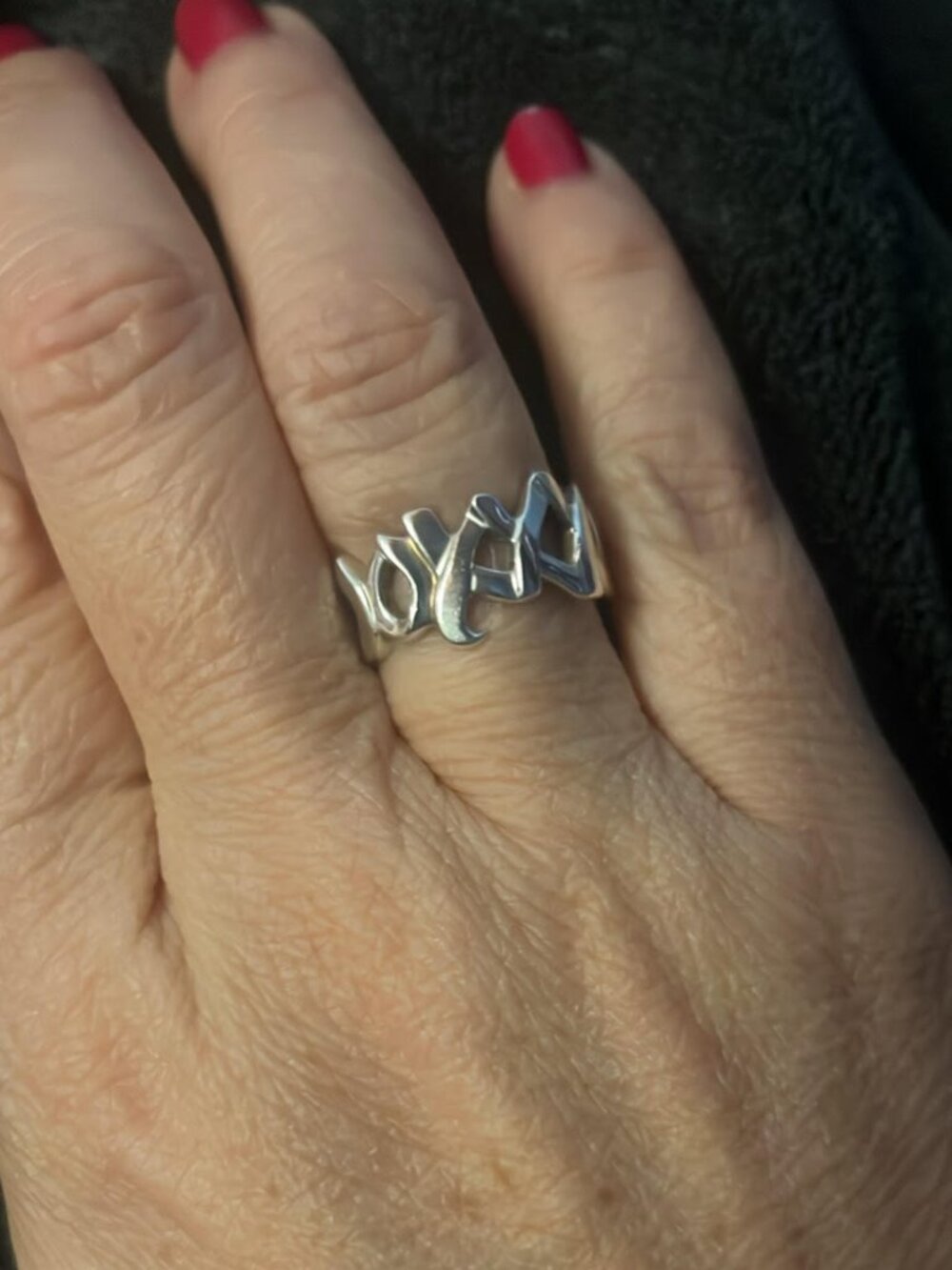 Tiffany and Company XOXO band ring size 7.5